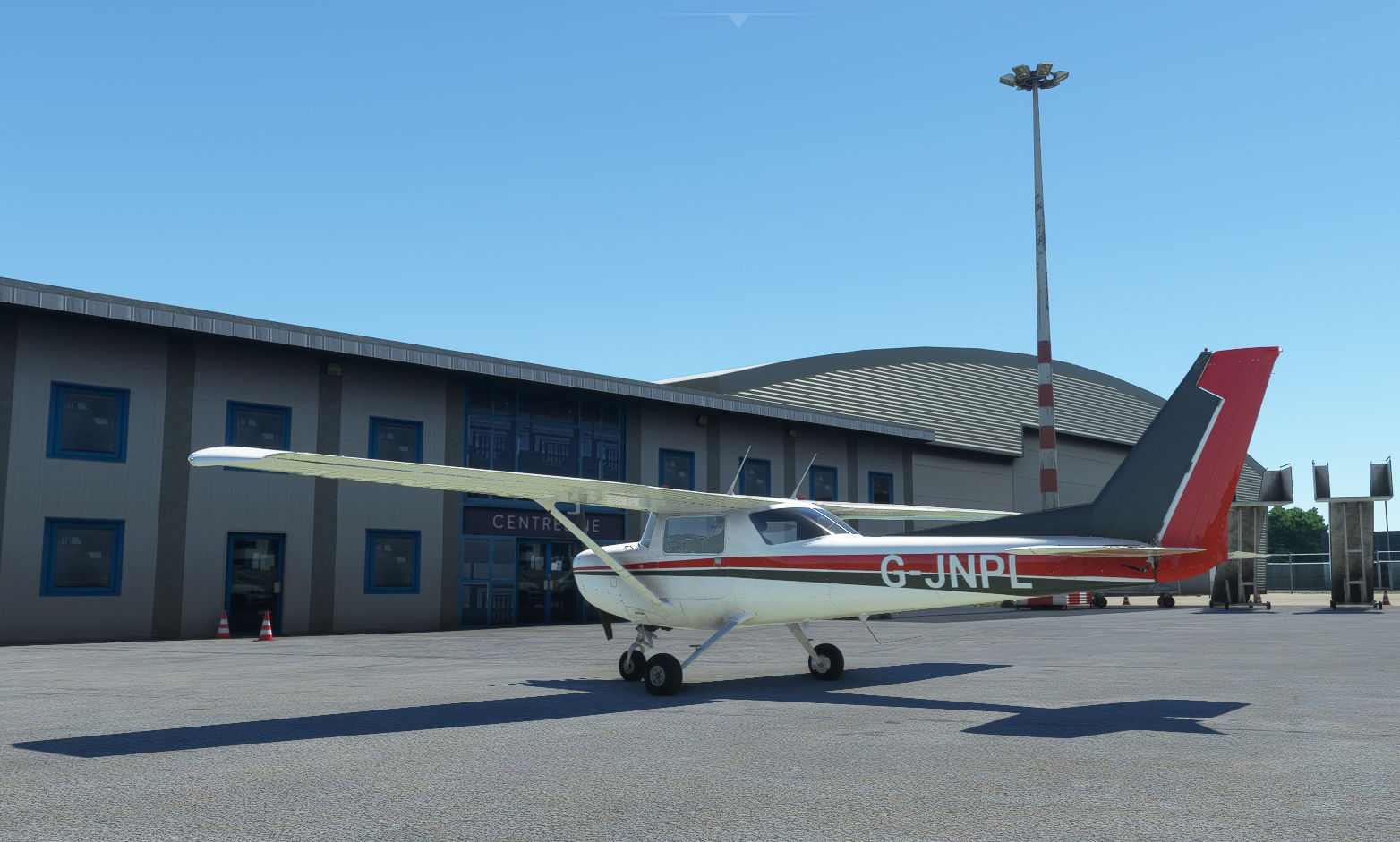 The Cessna 152 parked outside the flying school.